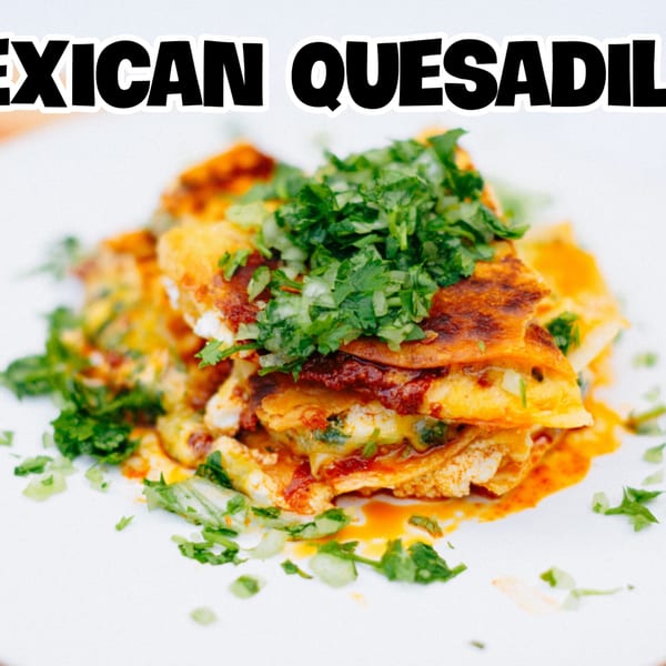Golden-brown quesadillas, generously topped with fresh cilantro and a rich red sauce, on a white plate.